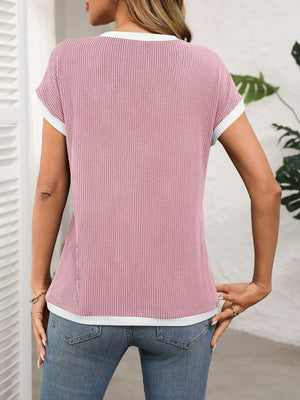 Ribbed knit tee in blush pink with white contrast piping and short sleeves.