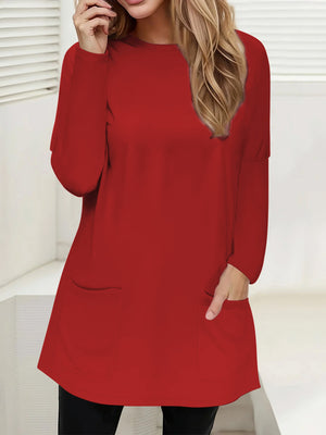 Red relaxed fit tunic with patch pockets and long sleeves.