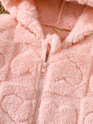 Dusty pink fuzzy hooded jacket with heart pattern and zipper detail.