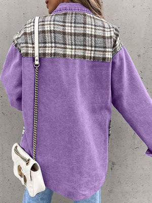 Purple denim jacket with plaid paneling on shoulders and sleeves.