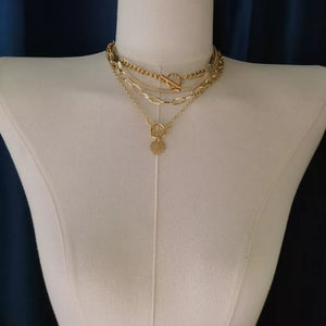 4-piece Layered Coin Pendant 18k Gold-plated Necklace in Gold, model styling view