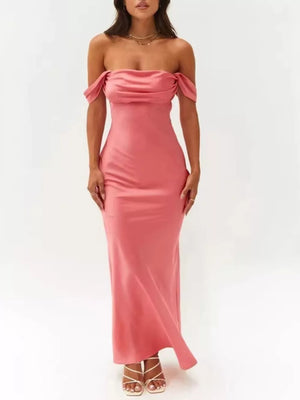 Coral satin off-shoulder maxi gown with draped neckline and bodycon fit.