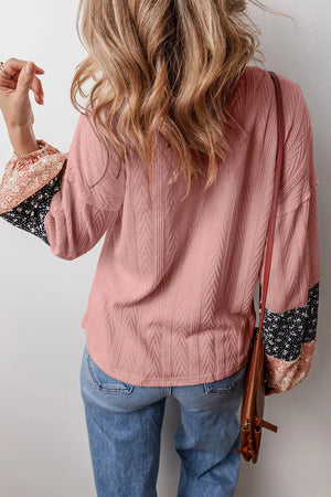 Dusty Pink textured sleeve blouse with mixed print cuffs and a relaxed fit.