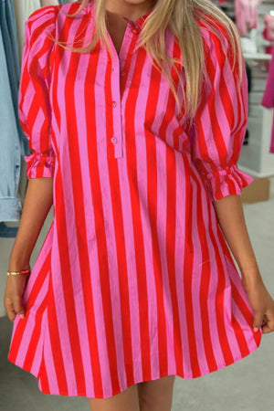 Mini dress with bold red and pink stripes, puff sleeves, and button-down front.