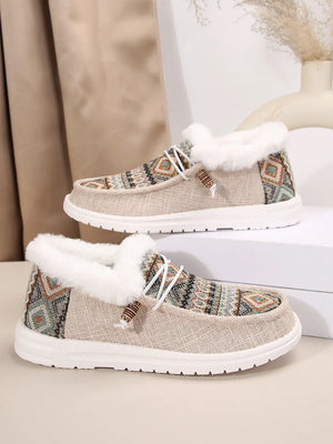 Southwestern print faux fur lined loafers in taupe with white laces and trim.