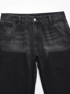 Black two-tone carpenter jeans with straight leg fit and visible stitching details.
