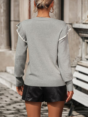 Light gray crew neck sweater with contrast trim ruffle shoulders