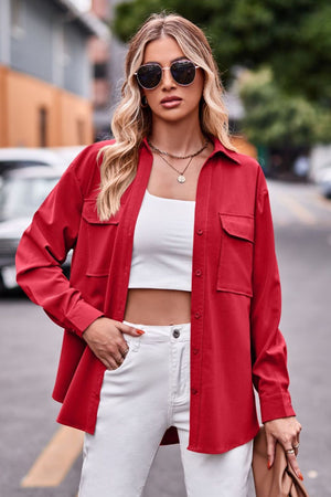 Oversized utility shirt in deep red with two chest pockets and button front.