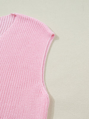 Pink acrylic V-neck sweater vest with ribbed texture and button front detail.