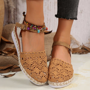Brown crochet espadrille wedge sandals with adjustable ankle strap and beaded anklet.