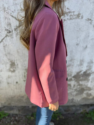 Dusty Pink double-breasted blazer with sculpted lapels and button detail.
