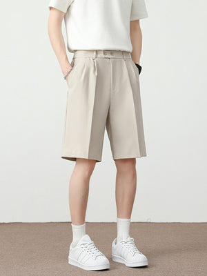 Men's cream chino shorts with pleated detail and loose fit
