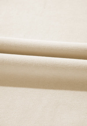 Beige wide-leg drawstring lounge trousers in soft knit fabric