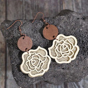 Layered rosewood drop earrings with rose design and glitter detail.