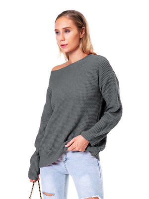 Charcoal waffle knit off-shoulder sweater with long sleeves and a relaxed fit.