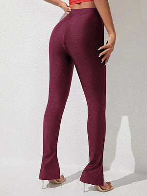 Wine split-hem leggings with center seam and cotton blend fabric.