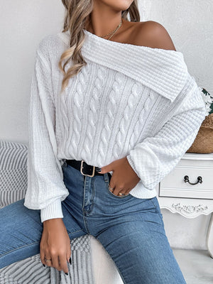 White off-shoulder cable knit pullover sweater with asymmetrical neckline and balloon sleeves.
