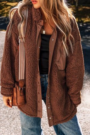 Brown teddy textured utility jacket with button front and chest pocket detail.