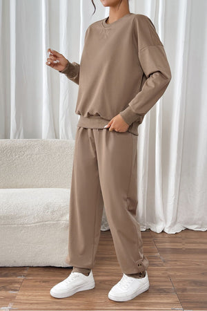 Camel relaxed fit loungewear set with crewneck sweatshirt and drawstring pants.