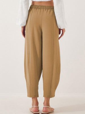 Camel balloon-leg trousers with drawstring waist and seam detail