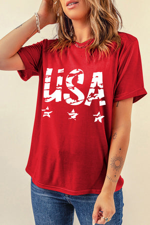 Red USA graphic tee with distressed lettering and stars, short sleeves, comfortable cotton blend.