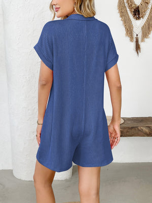 Dark Blue ribbed knit romper with collar and short sleeves.