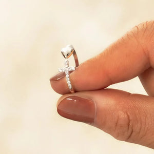 Silver ring with open heart and diamond cross detail