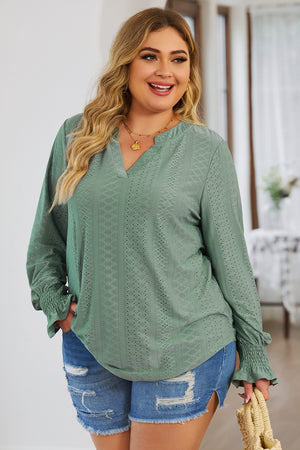Sage textured slit-neck blouse with shirred cuffs and eyelet detail.