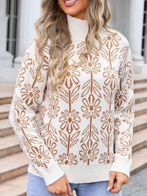 Geometric floral knit turtleneck pullover in cream with brown pattern.
