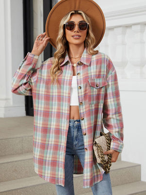 Oversized pastel plaid shacket with button front and chest pockets, worn open over a white top.
