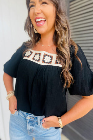 Black gauze blouse with crochet yoke and puff sleeves