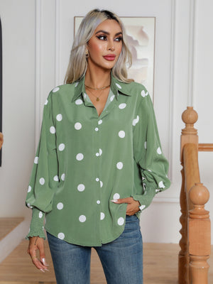Light green polka dot blouse with shirred cuffs and button front.