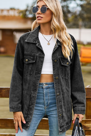 Black oversized denim trucker jacket with classic buttoned front and chest pockets.