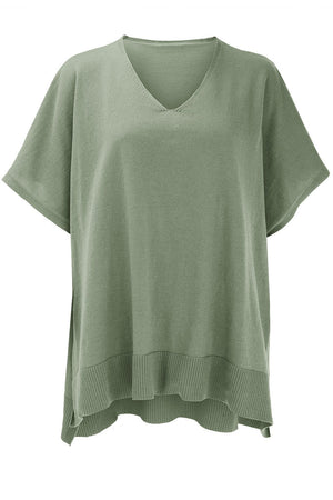 Sage green relaxed V-neck knit poncho top with short sleeves and ribbed hem.