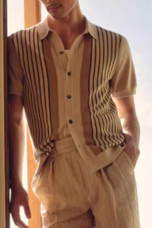 Beige knit polo shirt with vertical stripes and buttoned placket.