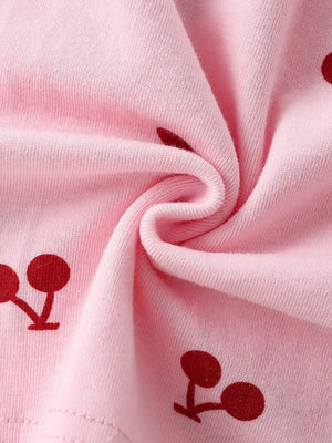 Children's blush pink cherry print short sleeve dress fabric detail