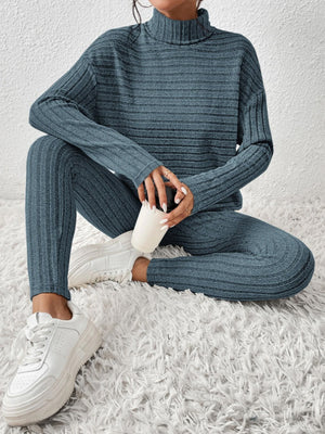 Deep Teal ribbed turtleneck lounge set with matching leggings, styled with white sneakers.