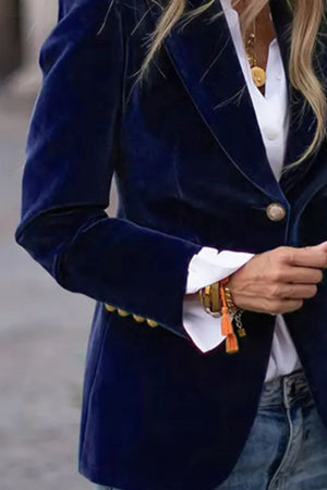 Navy velvet bolero jacket with gold buttons and ornate cuff detail.