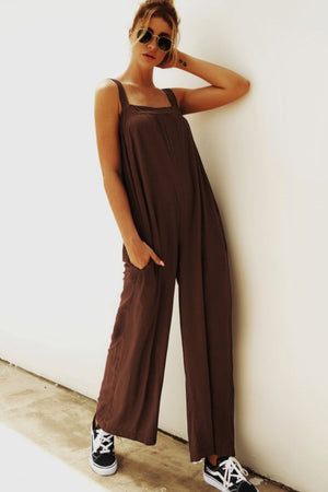 Chocolate square-neck palazzo jumpsuit with pockets and wide legs.