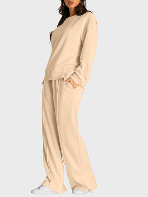 Tan loungewear set with crewneck sweatshirt and slit-front wide-leg trousers