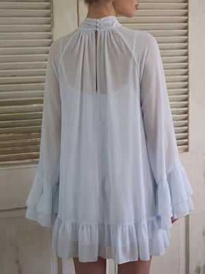 Sheer Mock Neck Flare Sleeve Dress in Sky Blue, model styling view
