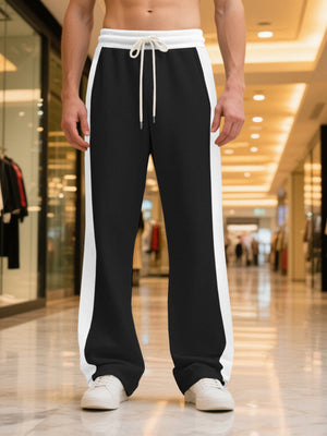Men's black sweatpants with white side stripes and drawstring waist.
