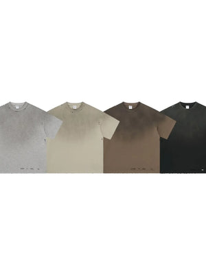 Distressed hem oversized t-shirts in ivory, taupe, gray, and black.