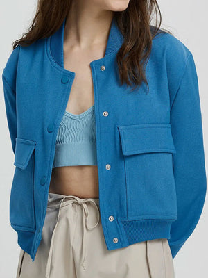 Boxy bomber jacket in Sky Blue with snap front, ribbed collar, and two chest pockets.