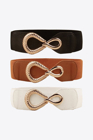 Elasticated waist belt in black, caramel, and white with sculpted gold alloy buckle.