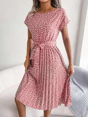 Floral print midi dress in blush pink with tie waist and pleated skirt