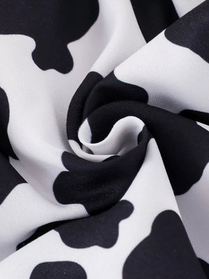 Children's Cow Print Ruffle Jumpsuit in Brown And White, fabric detail