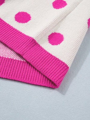 Cream knit top with hot pink polka dots and ribbed trim