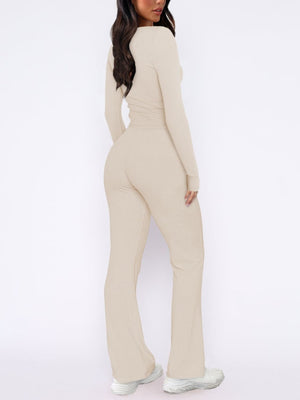 Beige loungewear set with long sleeve top and flared pants.