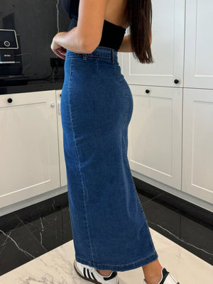 Button-front denim midi skirt in medium wash, with a slit and a fitted silhouette.